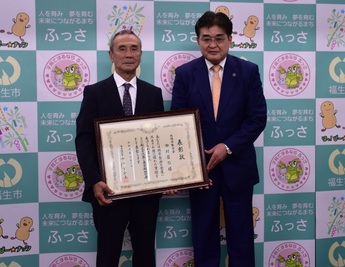 写真：田村昌巳さん（地域活動功労）