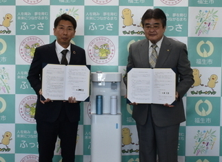 写真：ウォータースタンド株式会社との協定締結式